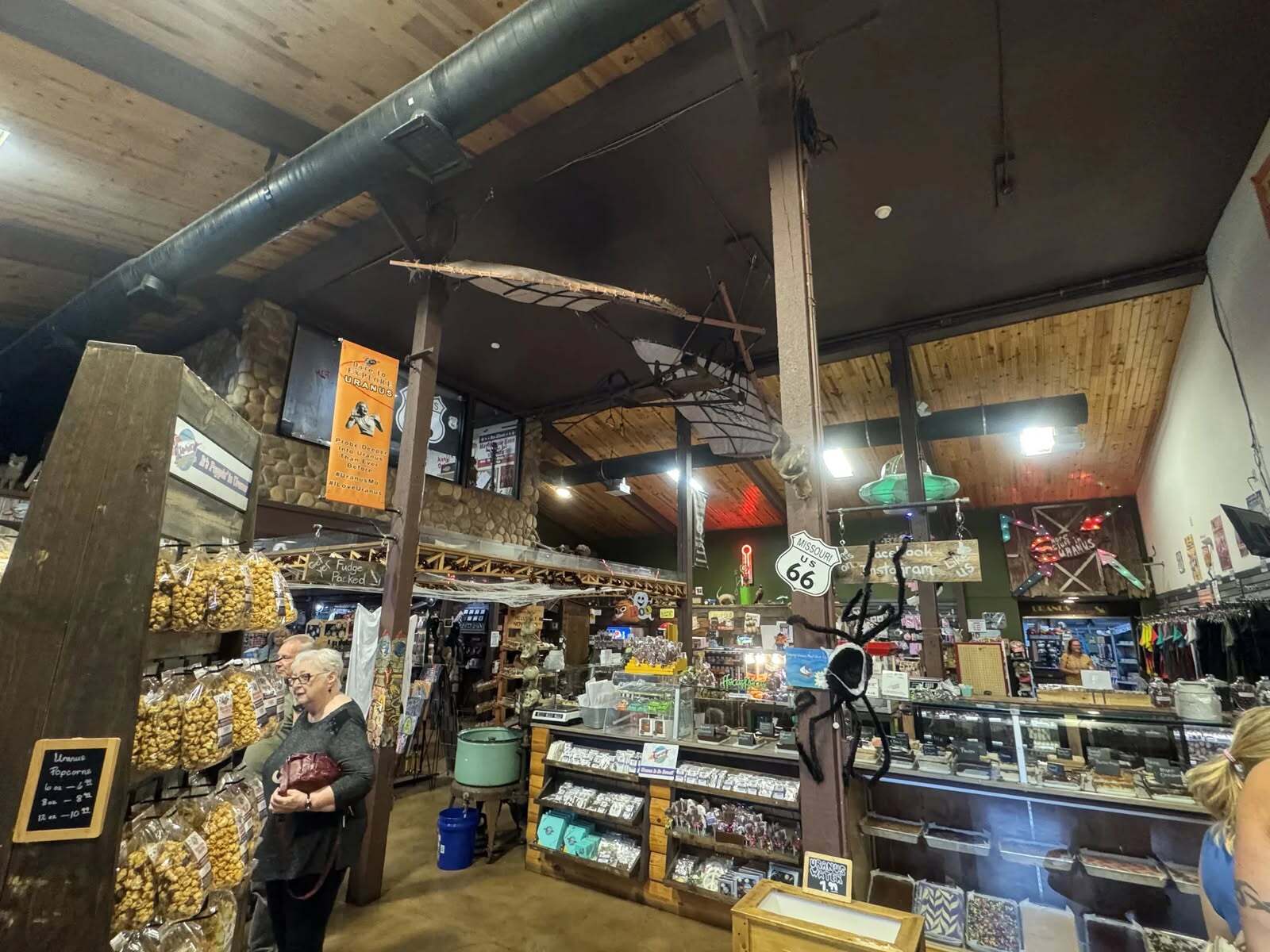 Interior of Uranus Fudge Factory and General Store in Uranus, Missouri showing fudge counter and other merchandise.